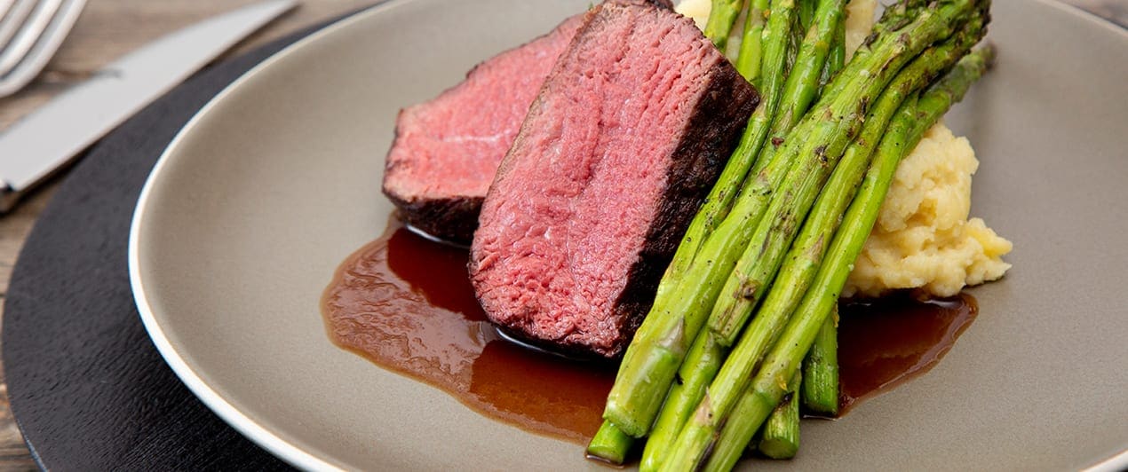 Jackson Hole event catered with fillet mignon and roasted asparagus
